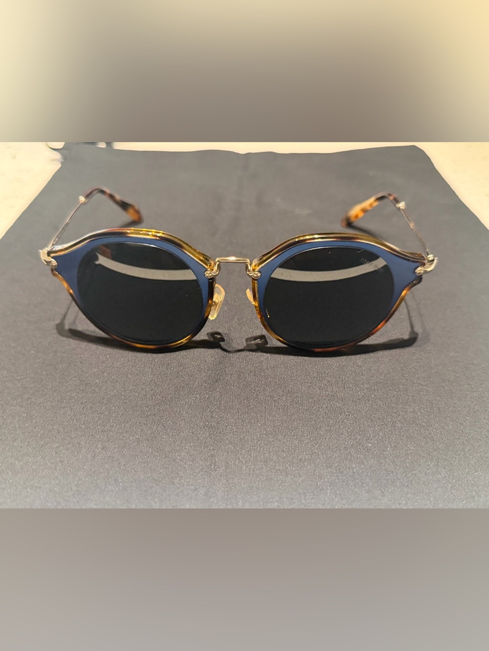 Miu Miu Round Sunglasses in Blue Lenses with Tortoiseshell Trim